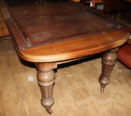 A late Victorian mahogany extending dining table, Extends to 8ft 3in. x 3ft 5in. H.2ft 5in.